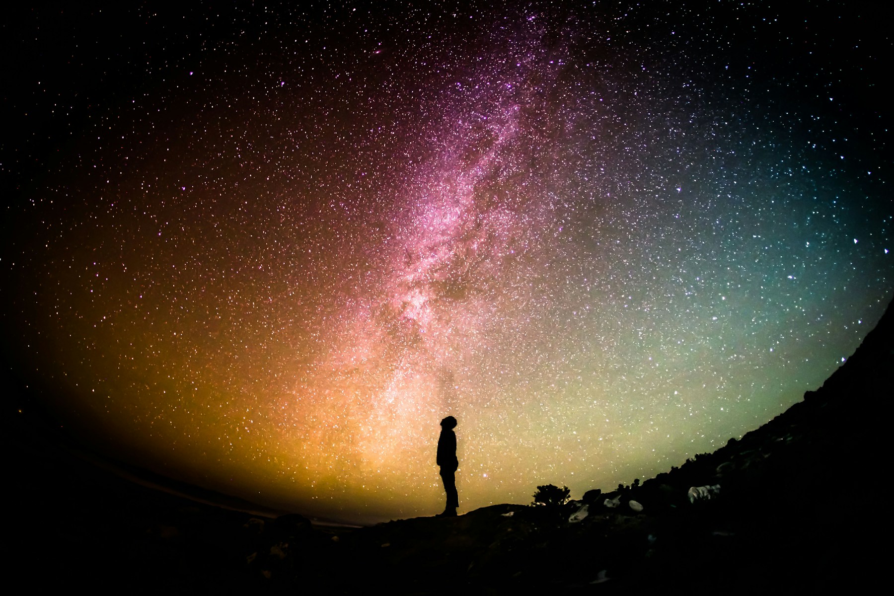 A clear night sky above a mountain observatory